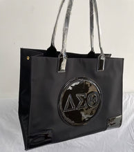 Load image into Gallery viewer, Black Nylon Tote Bag – Glossy Emblem Edition
