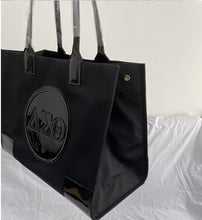 Load image into Gallery viewer, Black Nylon Tote Bag – Glossy Emblem Edition
