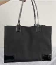 Load image into Gallery viewer, Black Nylon Tote Bag – Glossy Emblem Edition
